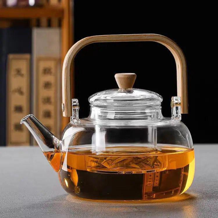 قوری وارداتی ساخت چین جنس پیرکس شعله مسقیم دسته بامبو گنجایش ۱۰۰۰ میل